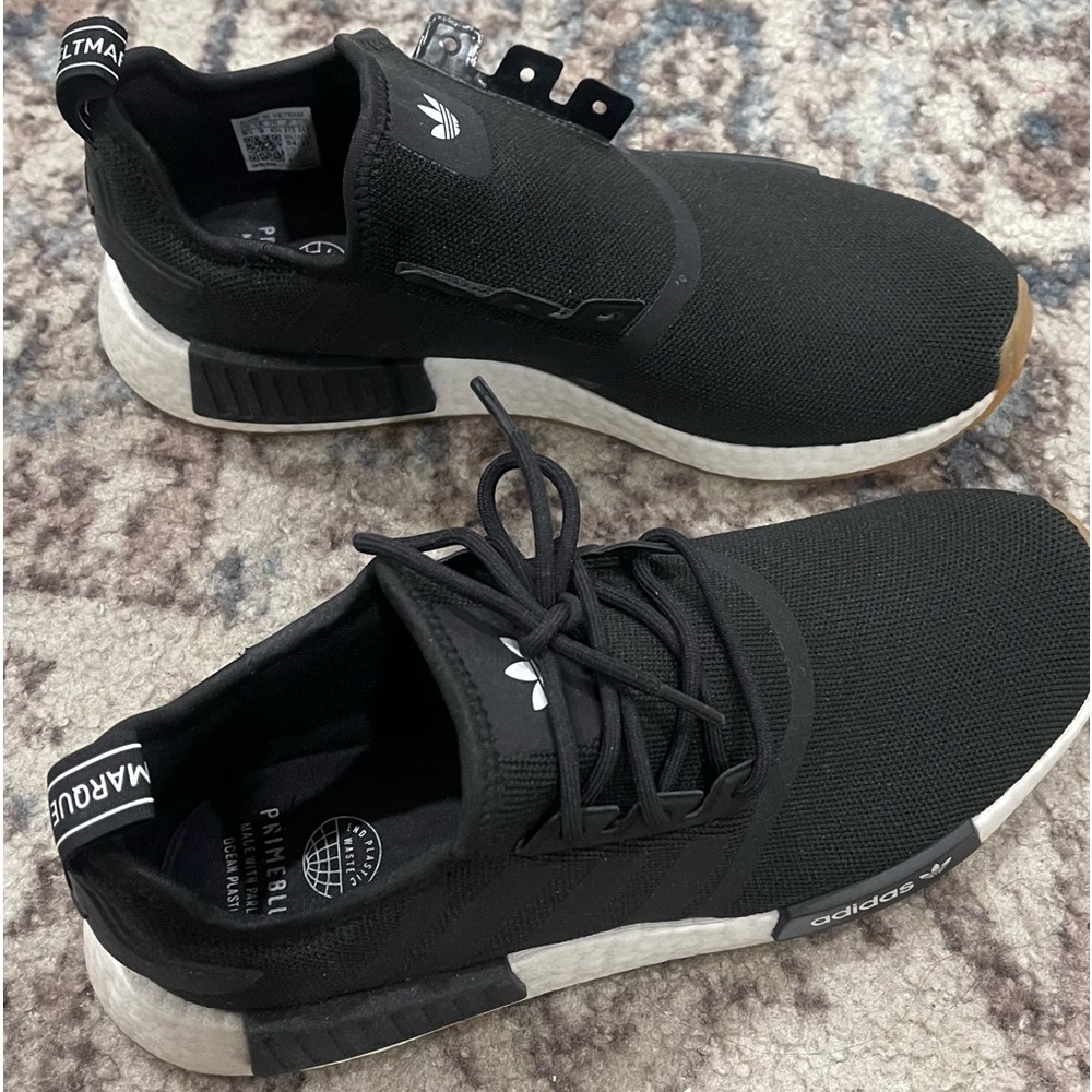 Adidas NMD r1 men is size 9.5